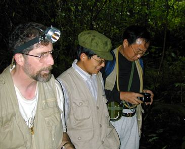 Academy Entomologist Charles Griswold and Chinese colleagues Liang Hongbin and Yan Hengmei in Qiqi forest