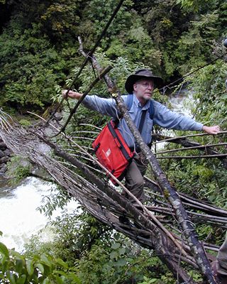 Bruce Bartholomew on rickety bridge